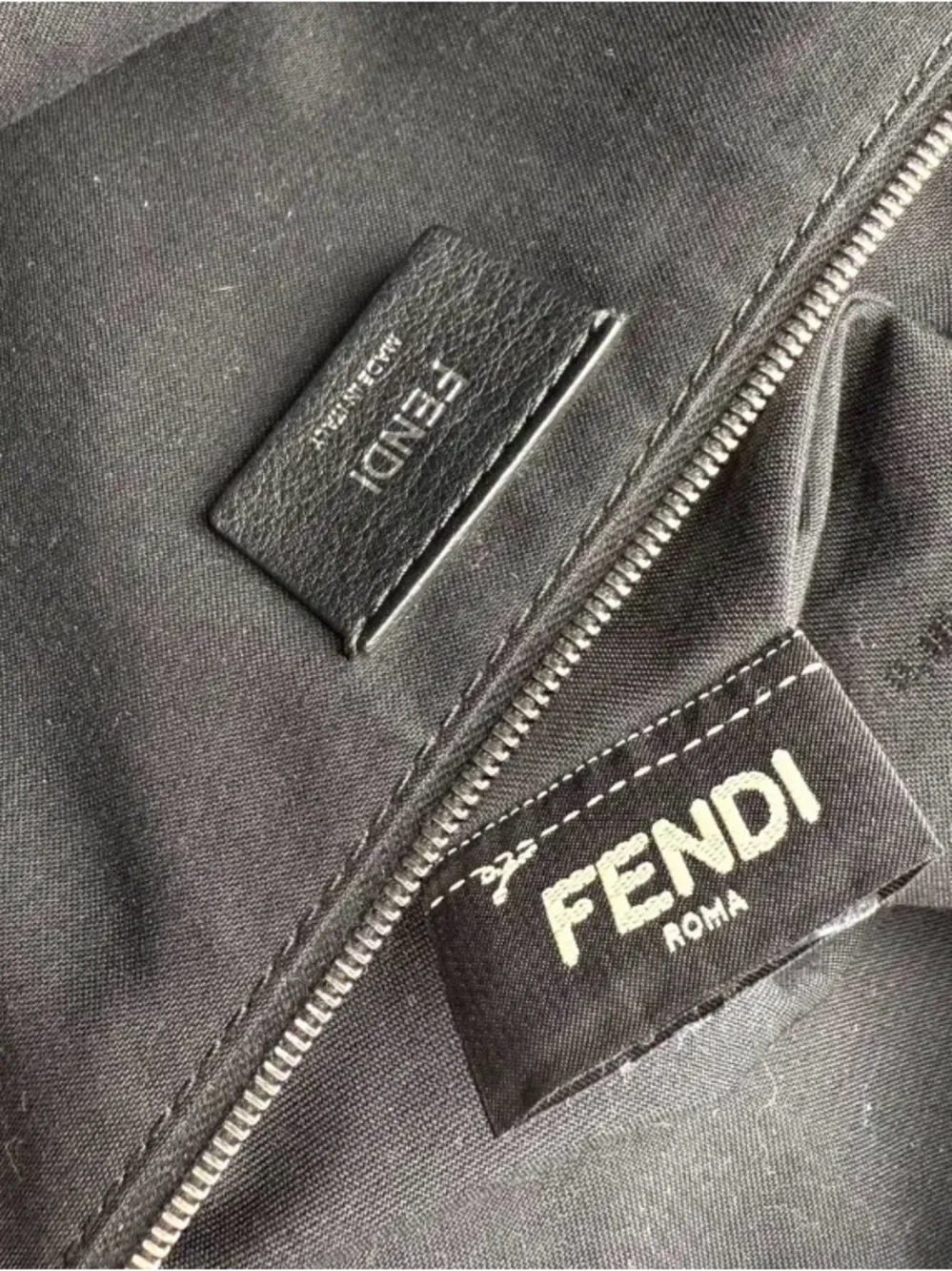 Fendi Black Backpack with Yellow Fur Eye Accents